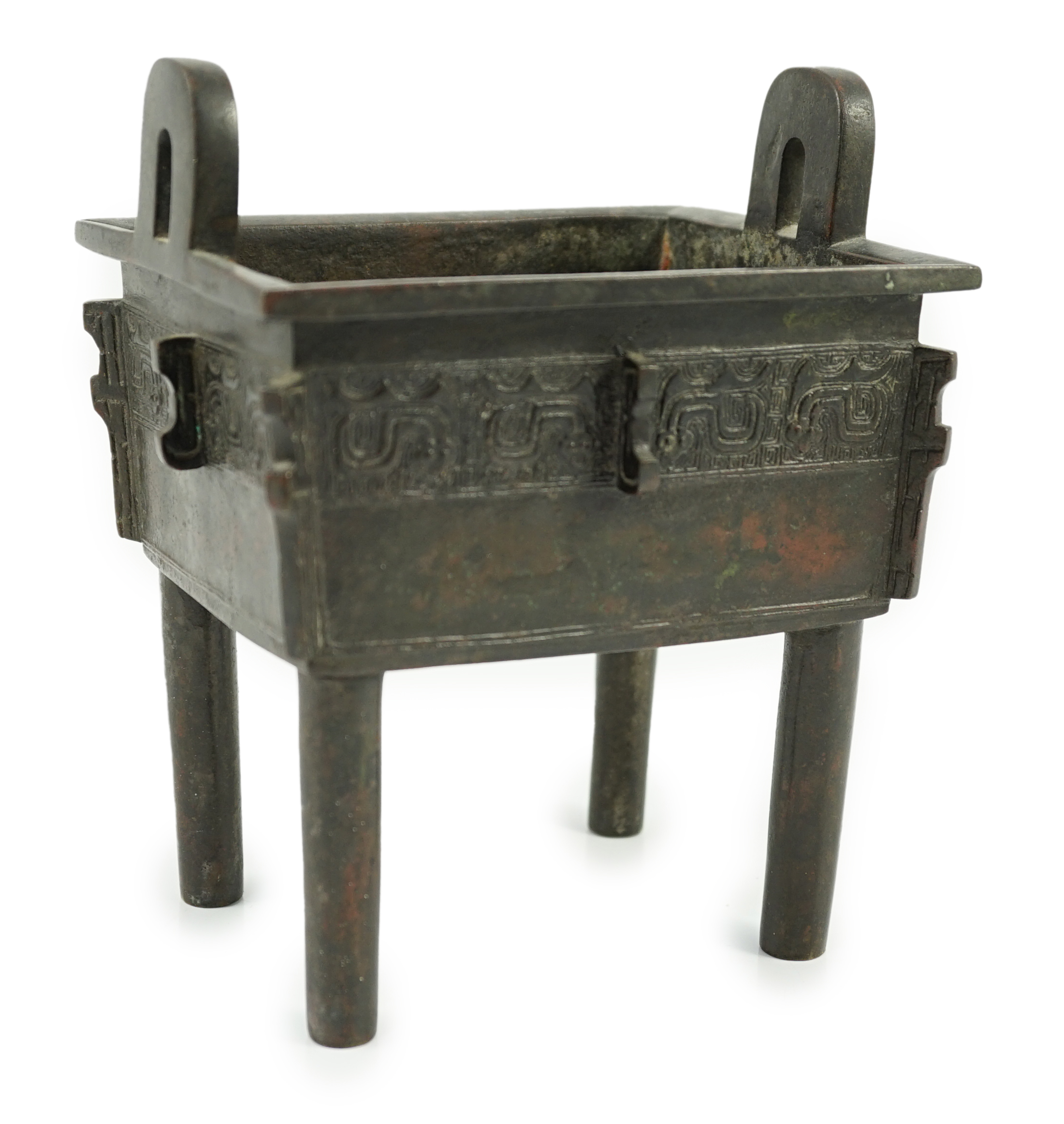 A Chinese archaistic bronze vessel, fangding, 17th/18th century, old repair to one leg